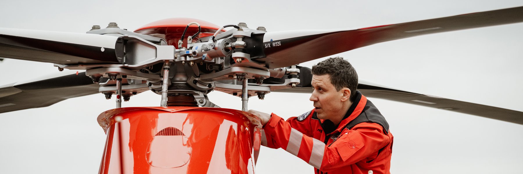Mechanic working on helicopter