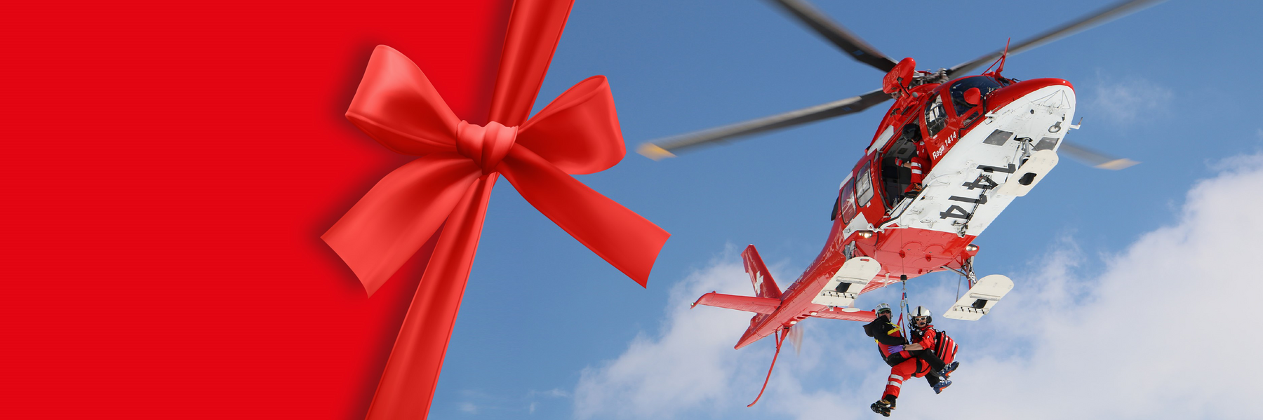 Helicopter in the air with gift mesh