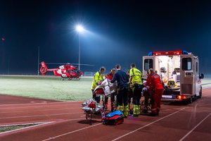 Ground ambulance and Rega helicopter on a rescue mission