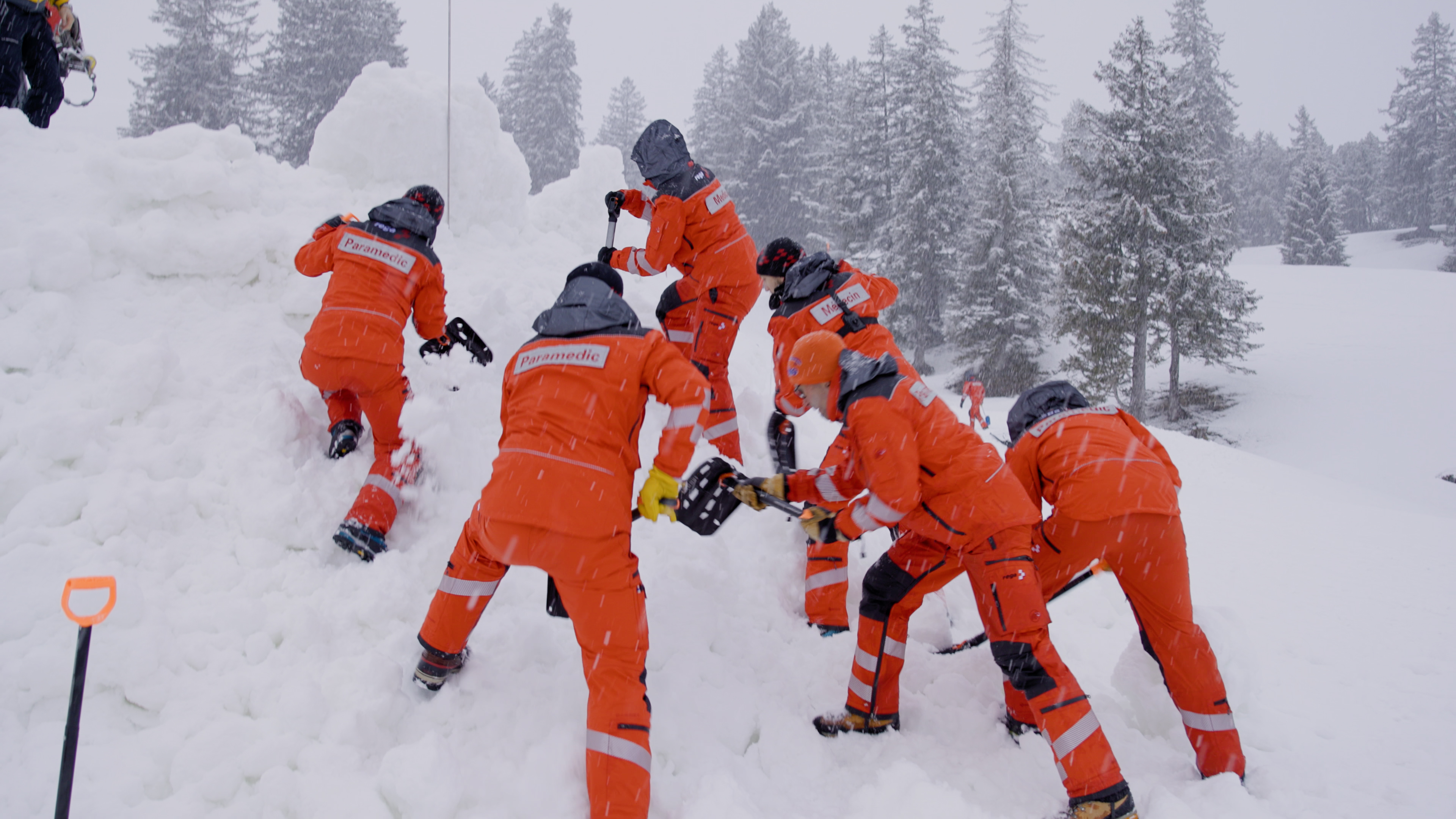 Rega staff during an avalanche drill